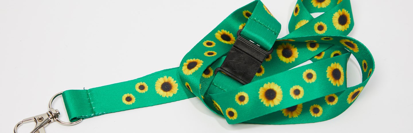 Solsikkesnoren - en keyhanger med sosikkesymbolet